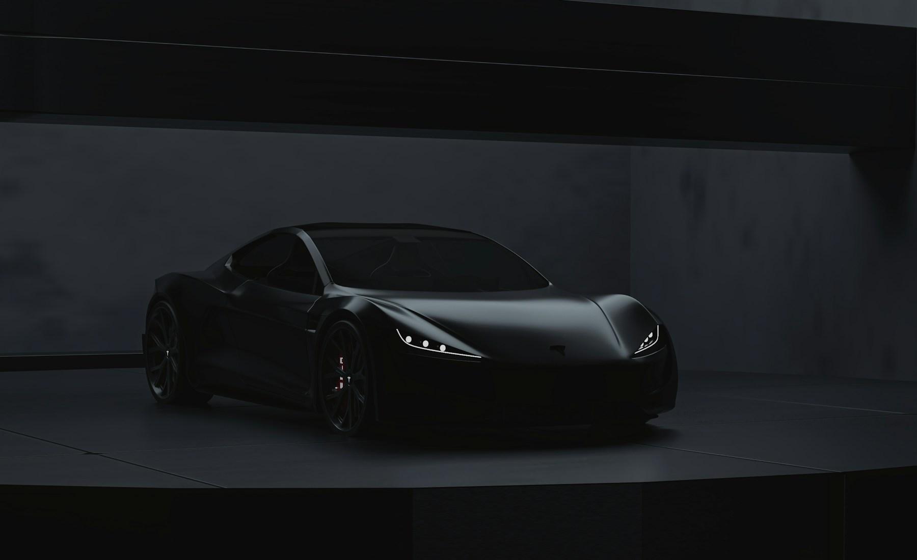 Black sports car in dark showroom